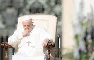 Pope Francis prays at his Wednesday audience in St. Peter’s Square on April 12, 2023. Daniel Ibáñez/CNA