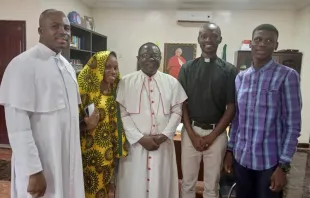 Formerly detained Father Oliver Opara (left) with Ummi Hassan; Bishop Matthew Kukah of the Diocese of Sokoto (not an abductee); Father Stephen Ojapah; and Hassan Fareed Hassan after the four were released from being held captive by terrorists. Photo courtesy of the Diocese of Sokoto